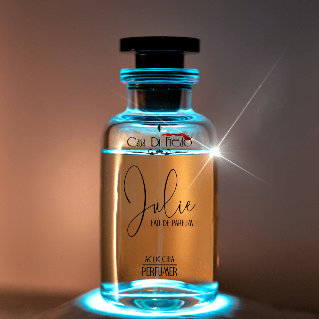 Julie perfume bottle on a blue light.