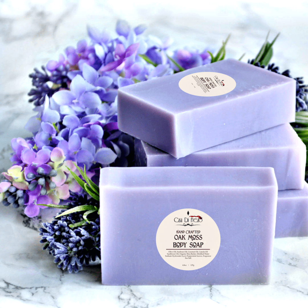 Purple oak moss body soap bars with flowers.