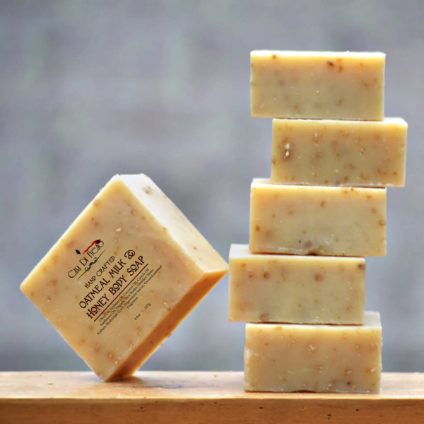 Stacked oatmeal milk and honey body soap bars.