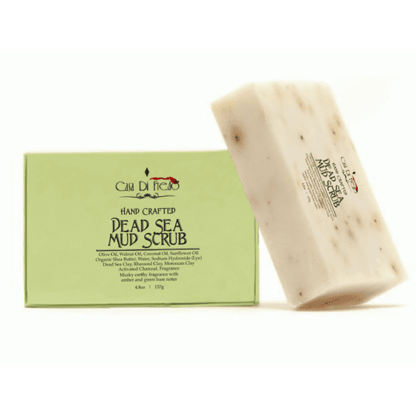 Dead Sea mud scrub bar in green box.