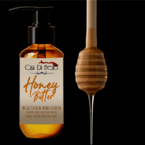 Honey butter hand lotion bottle and dipper.