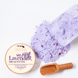 Purple bath salts with lavender flowers.